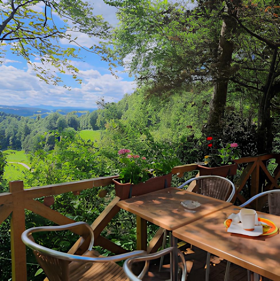 Terrasse des Pizzahüsli Menzu mit Blick ins Grüne